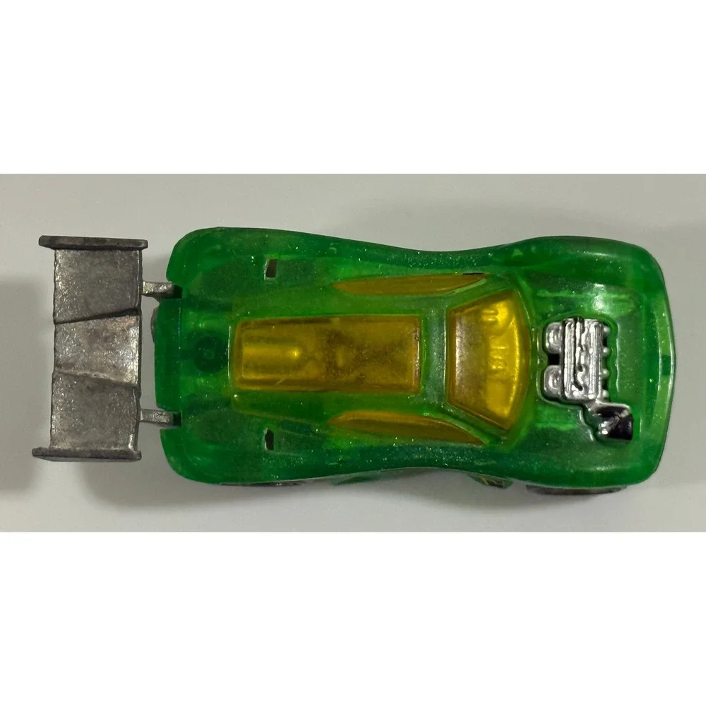 Hot Wheels Paradigm Shift Kids 1:64 Green Translucent Diecast Race Car Spoiler